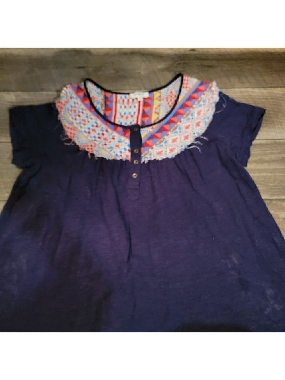 Umgee Mixed Material Navy and print fabric top with cap sleeves and scoop neck. - Picture 2 of 3